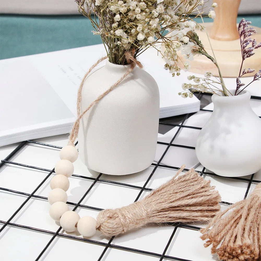 Holzperlengirlande Bauernhaus Wand