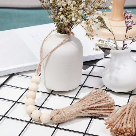 Holzperlengirlande Bauernhaus Wand